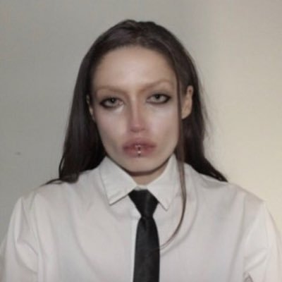 0xSinisterLady's profile picture. 🪱💻💅 $xavier $tokabu