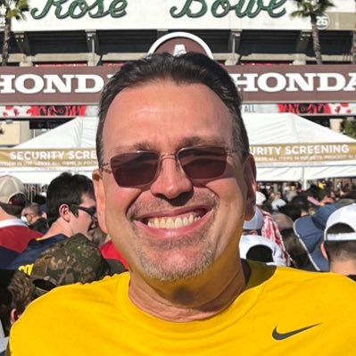 Father of two sons; Michigan fan; lawyer.