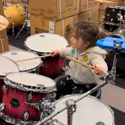 Just a 4yo girl who loves to rock out and dreams of getting a high five from Dave Grohl. Run by dad