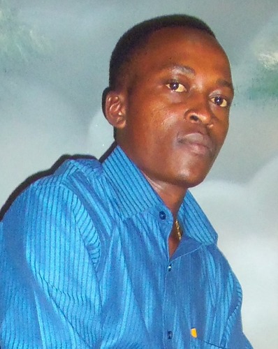 A writer with Standard Newspapers. 
Inseparable from his pen.
Simple life, great mind.