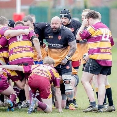 bearded rugby player/strongman