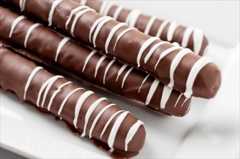 Chocolate........ Everyone's favorite tasty treat. Touched By Chocolate is pleased to bring you homemade chocolate treats. Each chocolate designed is carefully