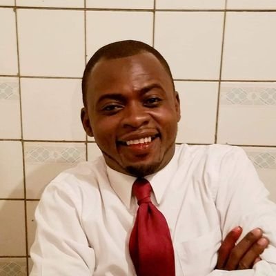 An English literature's teaching assistant at the University of Kinshasa, also known for his roles as a political analyst and activist.