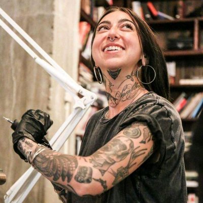 Hello, I'm Laura Carter, a skilled tattoo artist dedicated to bringing your visions to life. My work blends creativity and precision for custom, one-of-a-kind t