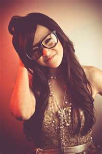 17 years old. Makes covers on YouTube. I can just explain myself more than 160 Characters. B-e-a-utiful. And Umm Single..? :]