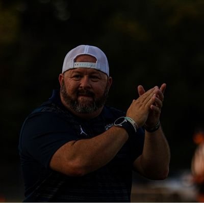 God first, Married, Father of 4 and love developing football players.