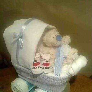 looking for a gift for a new born check out my nappy cakes, nappy prams, bath hampers and much more on facebook under lauras babycakes..