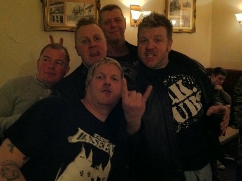 BlackWidowsPunk's profile picture. Four construction workers flying the punk rock flag. Mixture of originals and cover versions.