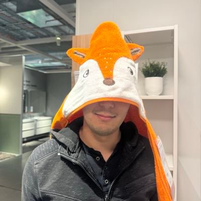 Demonic presence threat level 5. Born to deploy Kubernetes clusters. Works at the Hat Shop.
