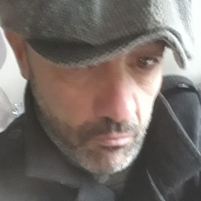 working class singer, songwriter, plasterer, pessimist, socialist.