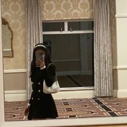 Originally from Malaysia, now living in the UK, runs a clothing shop