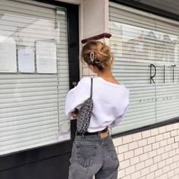 Originally from Malaysia, now living in the UK, runs a clothing shop