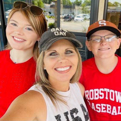 Coach's wife, mother of two, registered nurse, Aggie...