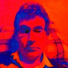 Starry-eyed dreamer. Flint-eyed realist.