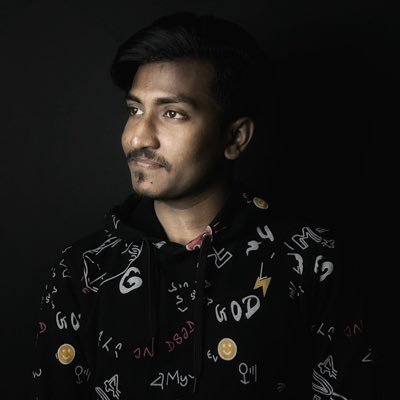 A programmer with a laptop is building something exciting!