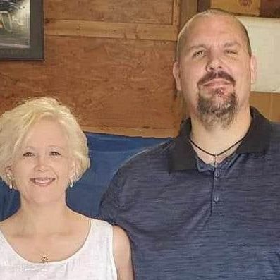 My husband, Dustin, and I are a Christian couple with three daughters and one son. He has Down syndrome and is in highschool. Our daughters are grown adults.