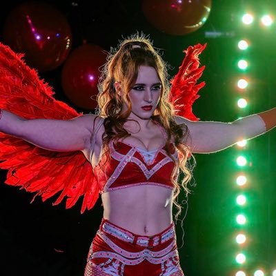 a woman of many names, formerly NXT’s Sloane Jacobs, currently pro wrestling’s Notorious Mimi and Apple TV’s Mimi Herr