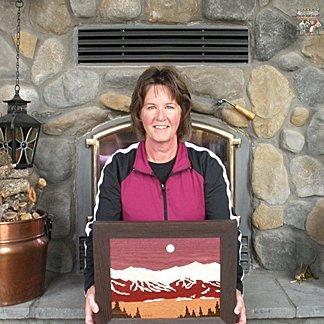 Colorado based woodworking artist specializing in handmade mountain marquetry scenes using natural woods.