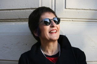 Library Management Consultant, Former University Librarian at SMU, expertise in digital libraries, library planning, strategic management