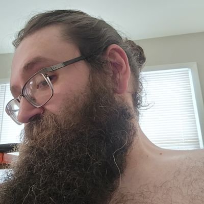 The longer haired bearded tattooed man with the belly that you might not like right away but it always makes you wonder.