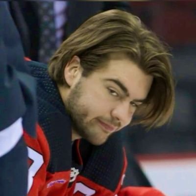 probably checking stats and surviving the horrors of devils hockey