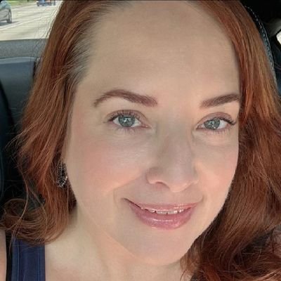 Sassy redhead who loves her dogs & turtles. Business owner