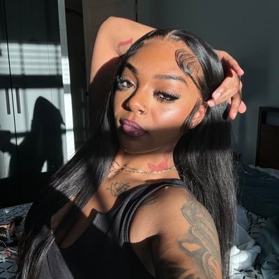 somewhere getting money & tattoos