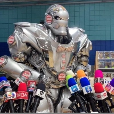 Owner of the 8 foot tall luxury robot that wear your brand logo and conveys your messages. Corporate Events, Conference, Trade Show Booths, Brand Building.