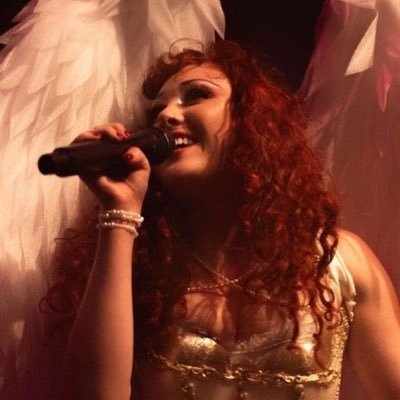 jnxloo's profile picture. me and my isis, growing black irises in the sunshine