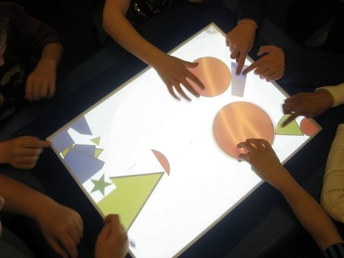 Mr Barrett's Year 5 class, exploring technology to support our learning - working with the SMART Table
