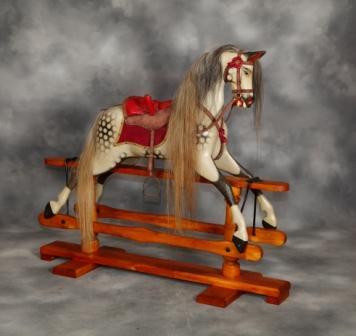 My passion is for fine antique rocking horses. I also love my pets, my daughters and grandson and my gypsy caravan which I escape to whenever I find the chance