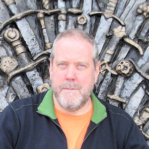 Keith lives in West London in a tiny, cluttered flat made of books and isn't half as clever as he thinks he is.