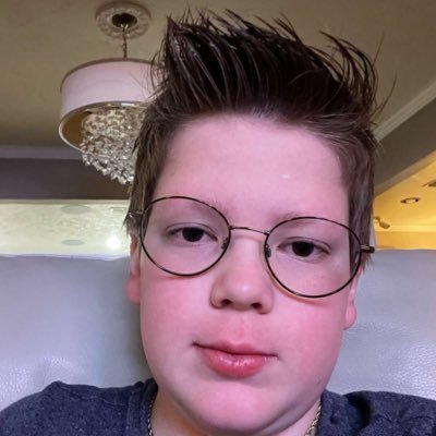 CravkJ's profile picture. black and filipino