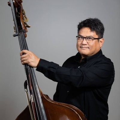 music academic, bass player, & relentless avant-garde tech-mediated creative type--normal & steady & reliable & affable person otherwise