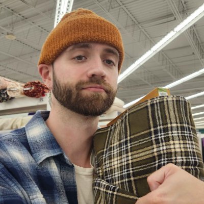 owns an orange hat Profile