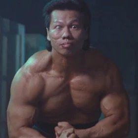 QPMiRay's profile picture. One-eyed, buff chinese guy from  the 90's.