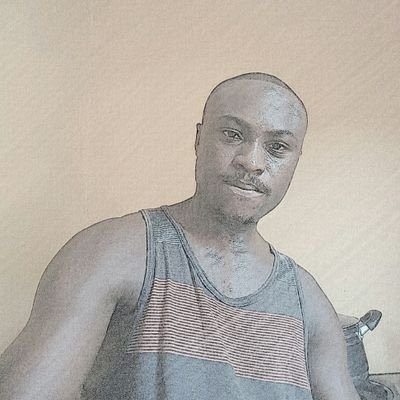 Acostic_Dmore's profile picture. {Manchester United fanatic.} A Humanitarian.