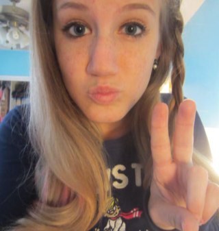 Captain of my tennis team, varsity cheerleader and taken by a handsome red headed football player. im perfect okay just accept it. ;) lmfao.