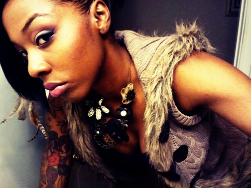 CrAzy - Sexy- Coo/ 22! -Tatted Up SHawty- Freelance MakeUp Artist/Stylist/Photographer; Prob The sweetest B* youll evr meet! :] how about that 4a Short story!