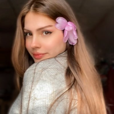 a universe lover who is obsessed with the rain, flowers and colors of the sky, and also a dentist