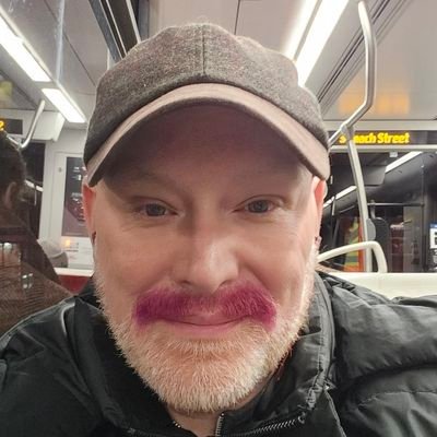 Business professional, mustache lover, and men's health and well-being advocate.