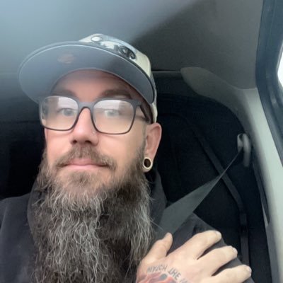 Ftcc007's profile picture. Bearded and tatted dad