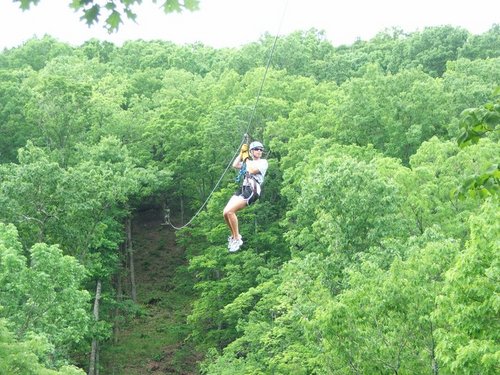 Eco Zipline Tours features a full tree top canopy tour of ten ziplines that span over a mile of cables for a high flying adventure. 3 courses total - Ages 3+