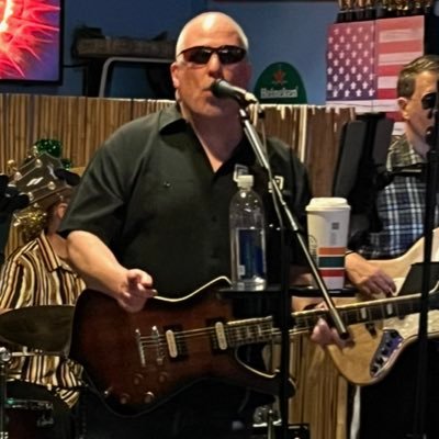 Guitar Player, Title Examiner, Loose Gannon