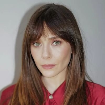 Elizabeth Olsen Updates Profile