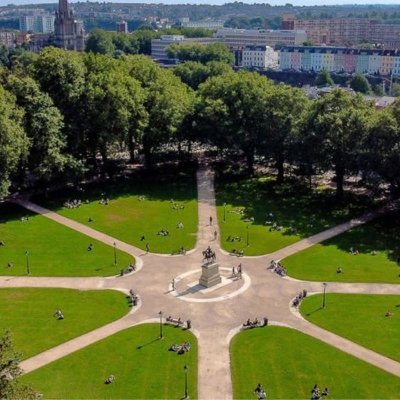 Queen Square is a magnificent Georgian park area in the heart of Bristol, surrounded by trees and cobbled streets.