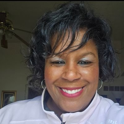Coach Bug Brown Profile