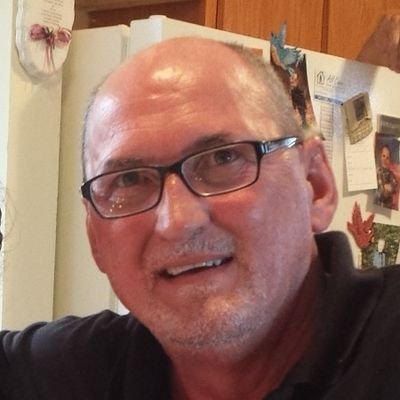 General Manager 
The Newfoundland Herald 
Detroit Red Wings fan.
City boy.
Married.