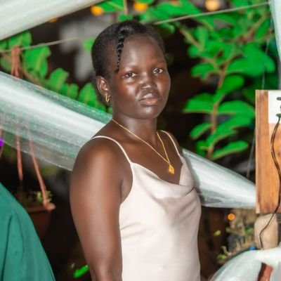 A publicist (PR).
She is the daughter of the land and the land herself, a jieng lady.