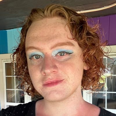 GingerDotDev's profile picture. queer emo techie racecar driver